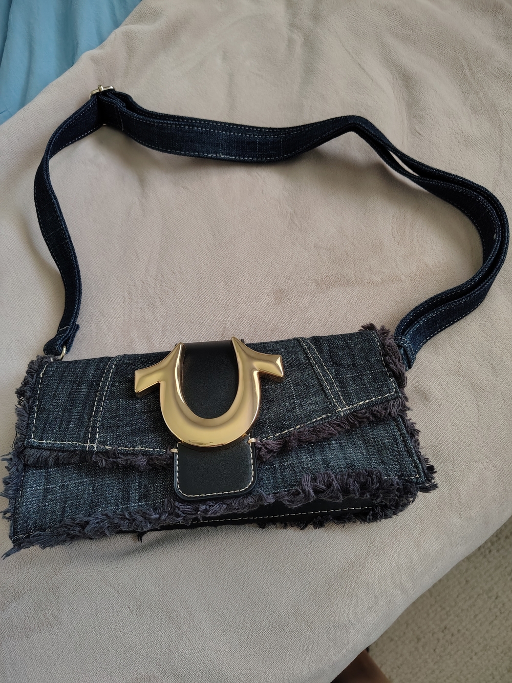 True Religion Dark Denim Crossbody with Gold Horseshoe Accent